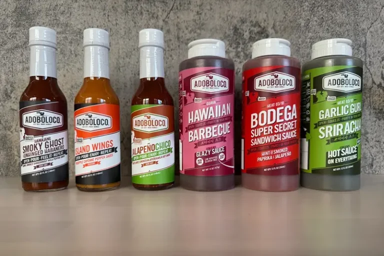 A variety of Adoboloco sauces from Hawaii’s island of Maui are displayed in New York. (Katie Workman via AP)