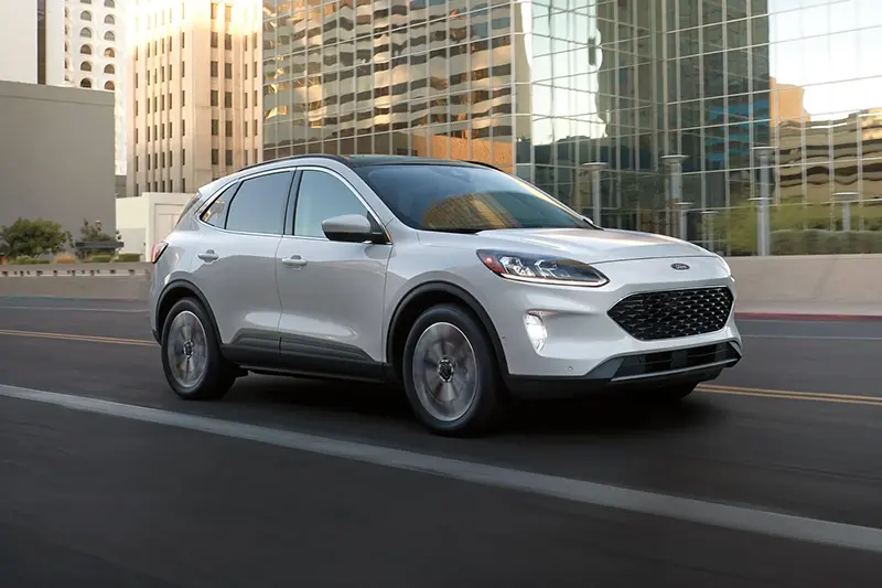 This photo provided by Ford shows the Escape, a compact SUV available as a hybrid on the used market for less than $25,000. (Courtesy of Ford Motor Co. via AP)