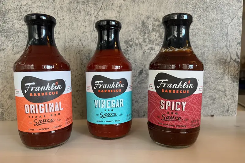 Bottles of Franklin BBQ sauces from Austin, Texas, are displayed in New York. (Katie Workman via AP)