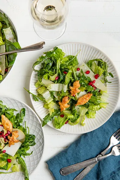 A recipe for Thanksgiving Salad, made with pears, parmesan and pomegranate seeds, is displayed in New York. (Cheyenne M. Cohen via AP)