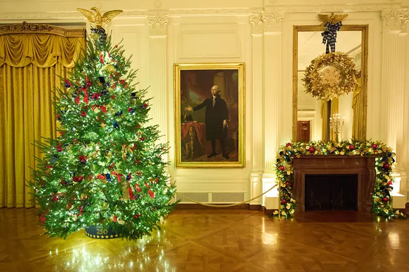 Christmas trees decorate the East Room of the White House during a press preview of the Christmas decorations “Home is Where the Heart Is,” Monday, Dec. 1, 2025, in Washington. (AP Photo/Evan Vucci)
