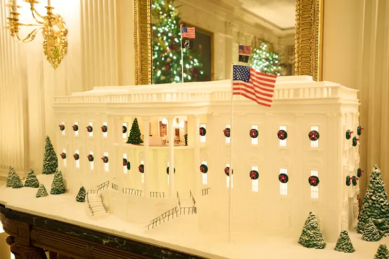 A Ginger Bread House decorates the State Dining Room of the White House during a press preview of the Christmas decorations “Home is Where the Heart Is,” Monday, Dec. 1, 2025, in Washington. (AP Photo/Evan Vucci)