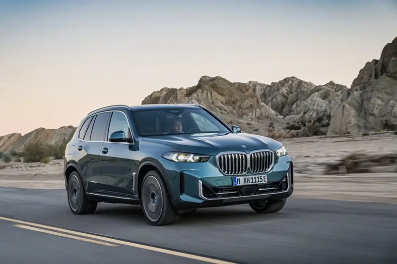 This photo provided by BMW shows the 2026 BMW X5. The xDrive50e version features an available powerful hybrid powertrain that contributes to its sporty driving dynamics. (Courtesy of BMW of North America via AP)