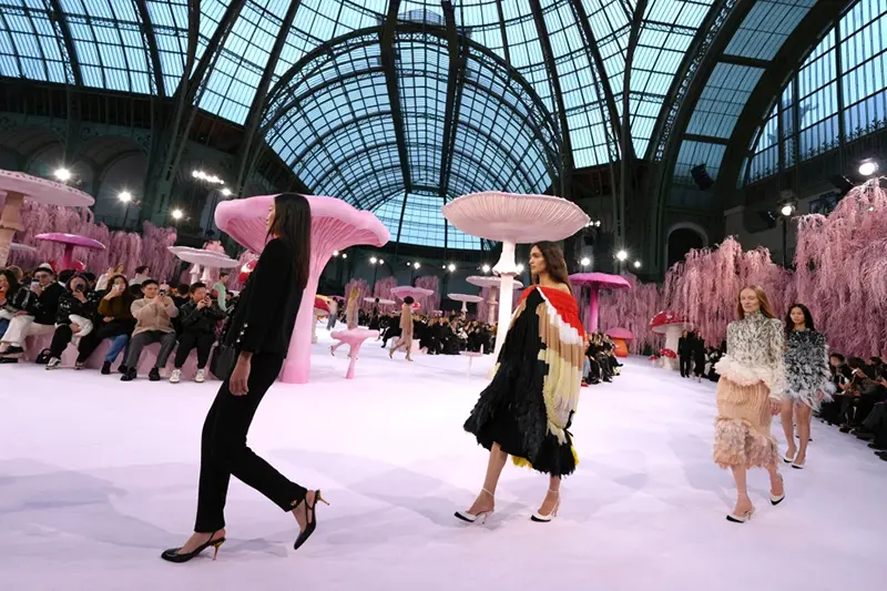 Models wear creations as part of the Chanel Spring/Summer 2026 Haute Couture collection presented in Paris, Tuesday, Jan. 27, 2026. (AP Photo/Aurelien Morissard)