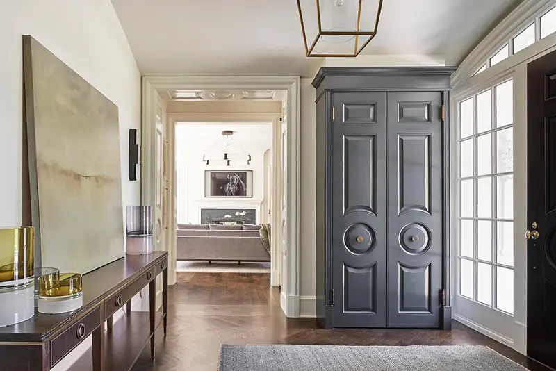 A built-in closet made with repurposed doors, right, appears in Highland Park, Ill. (Mike Schwartz via AP)