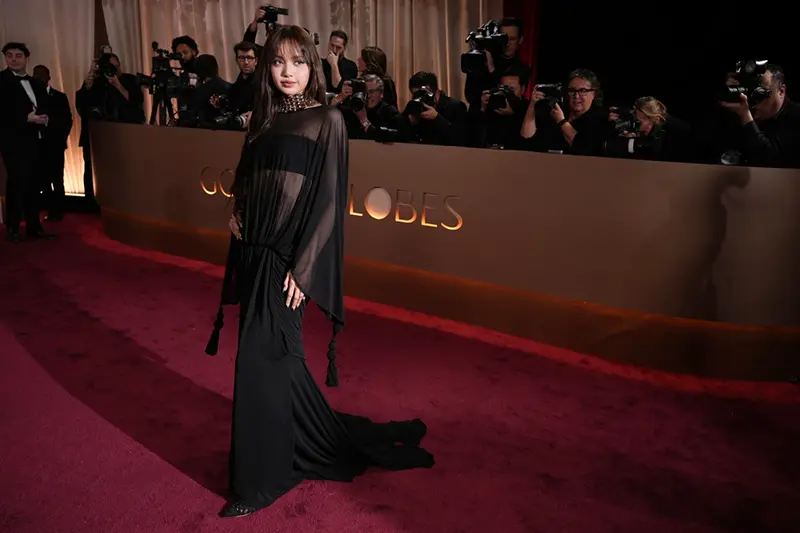 Lisa arrives at the 83rd Golden Globes on Sunday, Jan. 11, 2026, at the Beverly Hilton in Beverly Hills, Calif. (Photo by Jordan Strauss/Invision/AP)