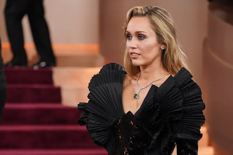 Miley Cyrus arrives at the 83rd Golden Globes on Sunday, Jan. 11, 2026, at the Beverly Hilton in Beverly Hills, Calif. (Photo by Jordan Strauss/Invision/AP)