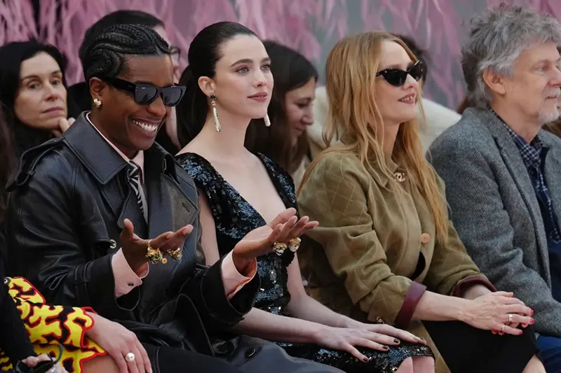A$AP Rocky, from left, Margaret Qualley and Vanessa Paradis attend the Chanel Spring/Summer 2026 Haute Couture collection presented in Paris, Tuesday, Jan. 27, 2026. (AP Photo/Aurelien Morissard)