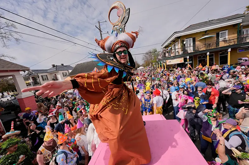 People gather for the start of the Society of Saint Anne’s parade on Mardi Gras Day, March 4, 2025 in New Orleans. (AP Photo/Gerald Herbert, File)