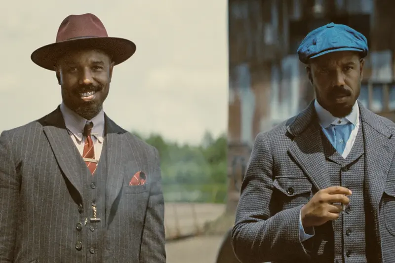 This image released by Warner Bros Pictures shows Michael B. Jordan portraying two characters in a scene from “Sinners.” (Warner Bros. Pictures via AP)