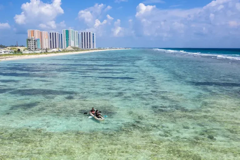 People kayak in the sea off Hulhumale Phase 2, one of two artificial islands built up to 3 metres above sea level next to the capital city of Male in Male, Maldives. (Photo by Carl Court/Getty Images)