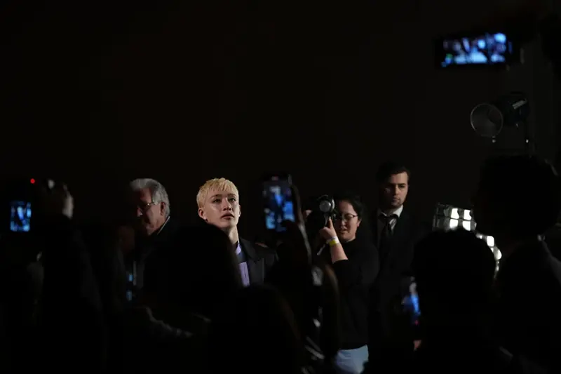 Bangchan of Stray Kids arrives for the Fendi Fall/Winter 2026-2027 Women’s collection presented in Milan, Italy, Wednesday, Feb. 25, 2026. (AP Photo/Antonio Calanni)