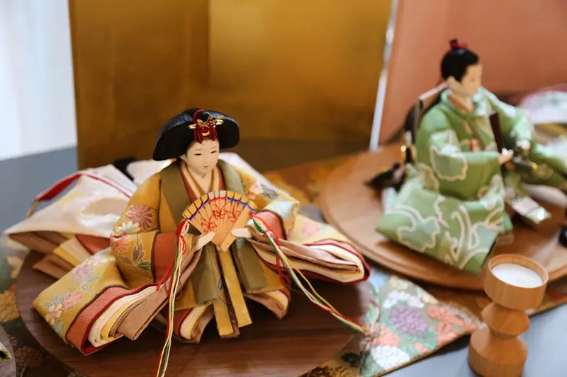 Dolls dressed in miniature kimonos made by designer Tomoko Ohkata from recycled kimonos are pictured in Tokyo, on Jan. 15, 2026. (AP Photo/Yuri Kageyama)