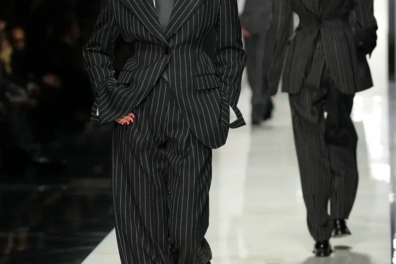 A model wears a creation from the Dolce & Gabbana Fall/Winter 2026-2027 Women’s collection, presented in Milan, Italy, Saturday, Feb. 28, 2026. (AP Photo/Antonio Calanni)