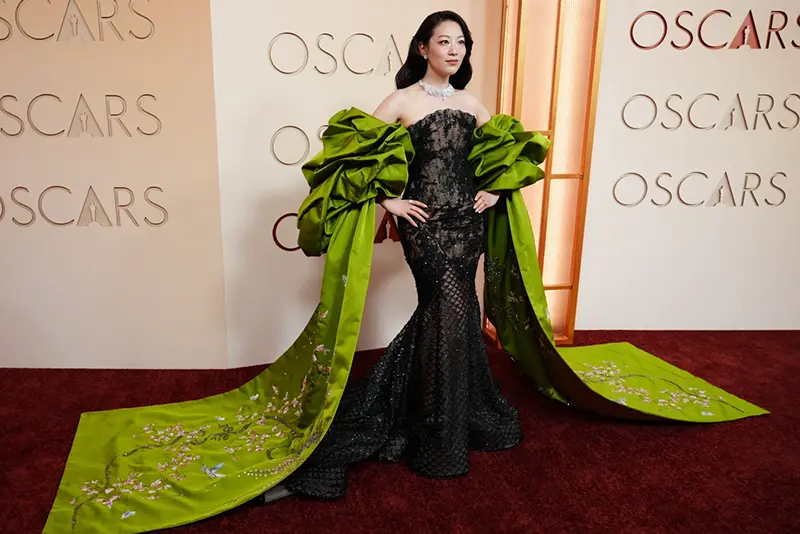 Arden Cho arrives at the Oscars on Sunday, March 15, 2026, at the Dolby Theatre in Los Angeles. (Photo by Richard Shotwell/Invision/AP)