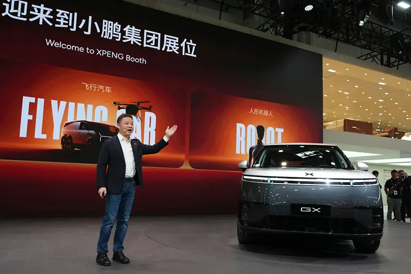 He Xiaopeng, Chairman and CEO of XPENG speaks at the Auto China 2026 in Beijing, Friday, April 24, 2026. (AP Photo/Ng Han Guan)