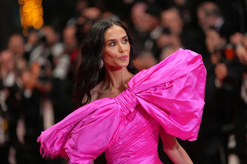 Jury member Demi Moore poses for photographers upon arrival at the premiere of the film ‘Paper Tiger’ at the 79th international film festival, Cannes, southern France, Saturday, May 16, 2026. (AP Photo/Andreea Alexandru)