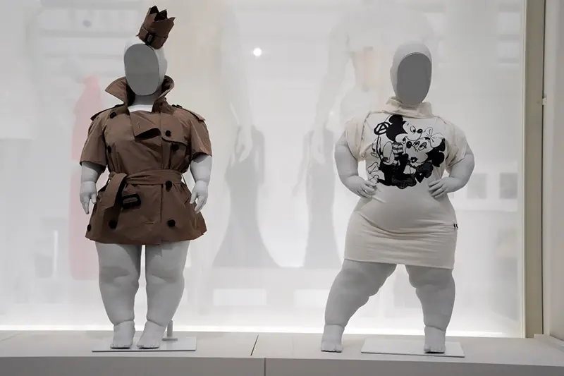 Designs by Burberry, left, and Vivienne Westwood are displayed on Sinéad Burke mannequins in the “Disabled Body” section of the Metropolitan Museum of Art’s Costume Institute exhibition, “Costume Art,” on Saturday, May 2, 2026, in New York. (Photo by Charles Sykes/Invision/AP)