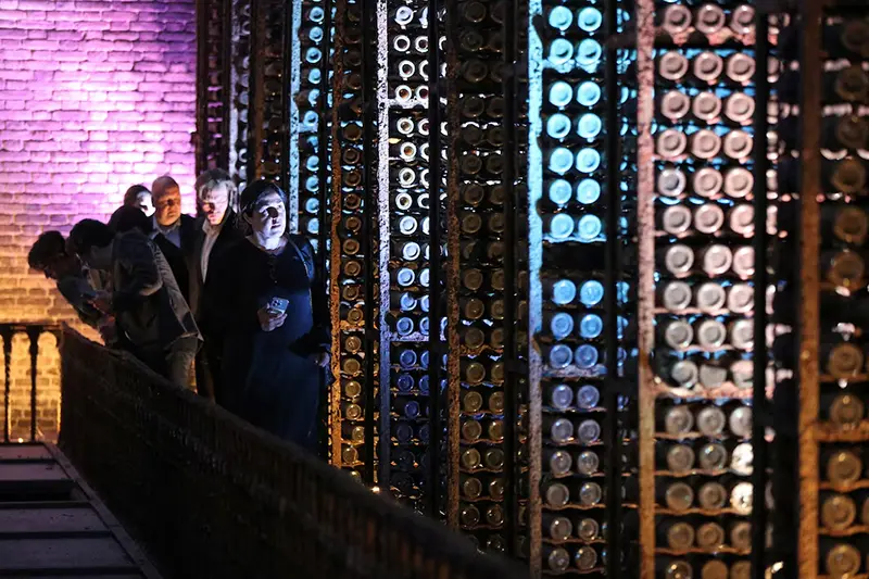 People attend the opening ceremony of a wine cellar housing a collection of rarities from the 19th and 20th centuries, once owned by Soviet leader Joseph Stalin, in Tbilisi, Georgia May 28, 2026. REUTERS/Irakli Gedenidze