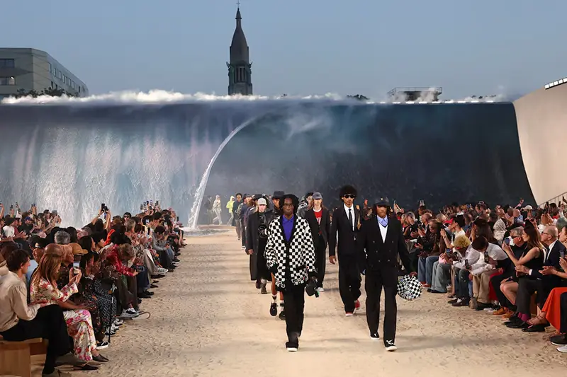 Models present creations by designer and musician Pharrell Williams as part of his Menswear Spring-Summer 2027 collection show for fashion house Louis Vuitton during Men's Fashion Week in Paris, France. REUTERS/Gonzalo Fuentes