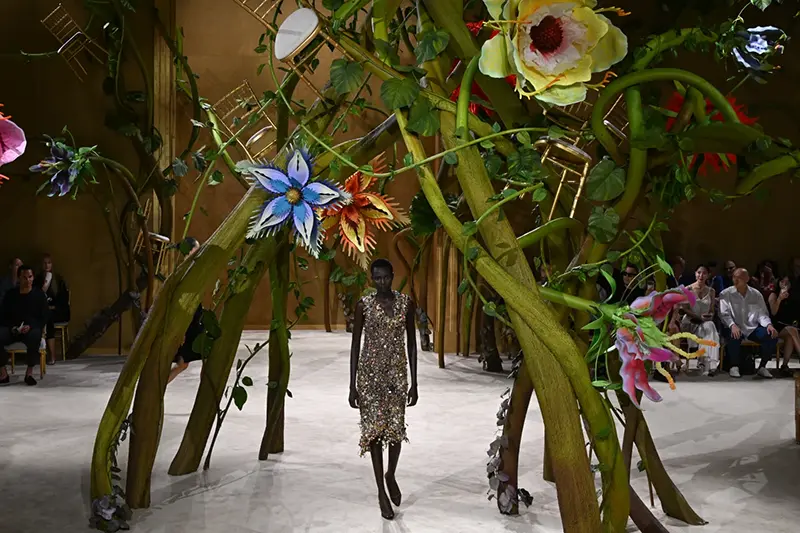 A model wears a creation as part of the Chanel Haute Couture Fall/Winter 2026-2027 Women’s collection presented in Paris, Tuesday, July 7, 2026. (AP Photo/Emma Da Silva)