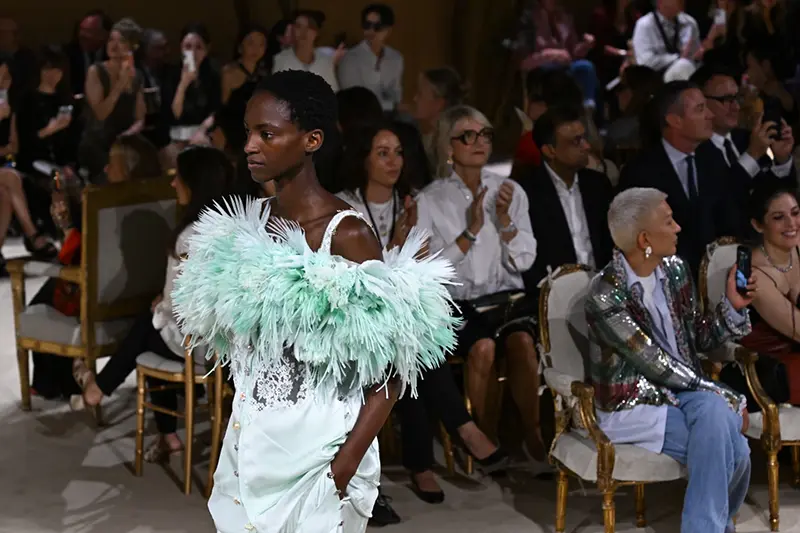 A model wears a creation as part of the Chanel Haute Couture Fall/Winter 2026-2027 Women’s collection presented in Paris, Tuesday, July 7, 2026. (AP Photo/Emma Da Silva)