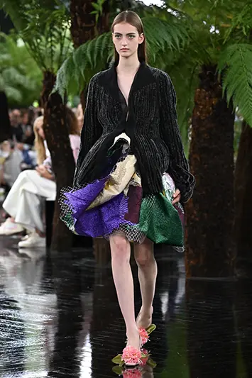 A model wears a creation as part of the Christian Dior Haute Couture Fall/Winter 2026-2027 Women’s collection presented in Paris, Monday, July 6, 2026. (AP Photo/Emma Da Silva)