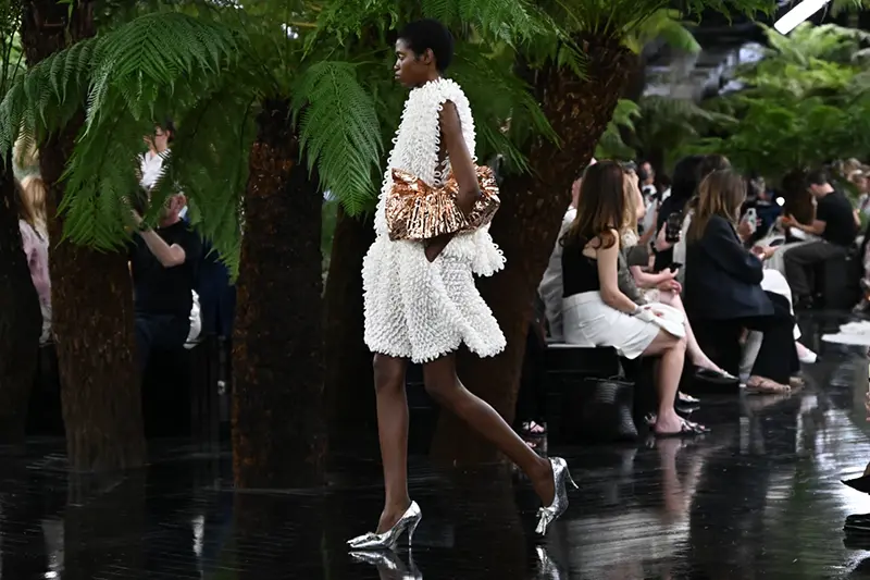 Models wear creations as part of the Christian Dior Haute Couture Fall/Winter 2026-2027 Women’s collection presented in Paris, Monday, July 6, 2026. (AP Photo/Emma Da Silva)