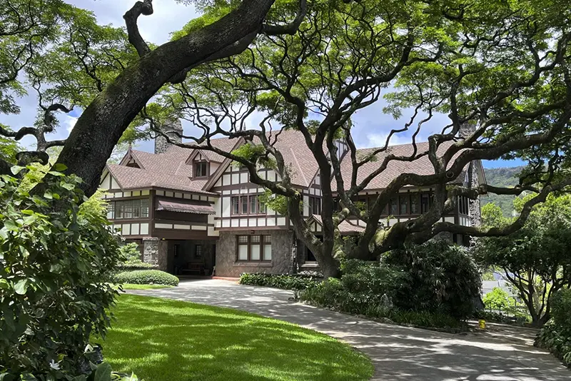 This image shows an exterior view of the Manoa Heritage Center in Honolulu, founded in 1996 by Sam and Mary Cooke in 1996. (Kristina Linnea Garcia via AP)