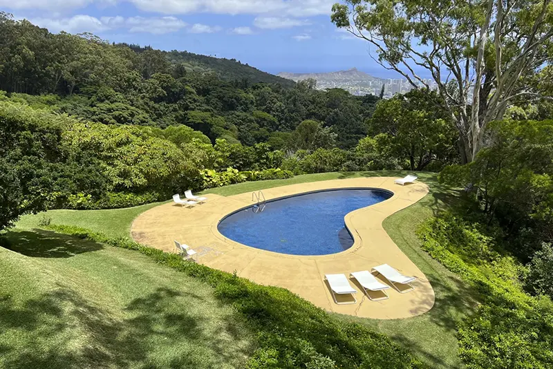 This image shows the kidney-shaped pool at the Liljestrand House in Honolulu, Hawaii, designed by architect Vladimir Ossipoff. (Kristina Linnea Garcia via AP)