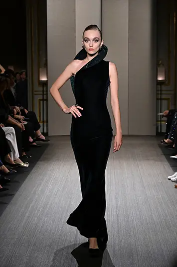 A model wears a creation as part of the Giorgio Armani Privé Haute Couture Fall/Winter 2026-2027 Women’s collection presented in Paris, Tuesday, July 7, 2026. (AP Photo/Emma Da Silva)