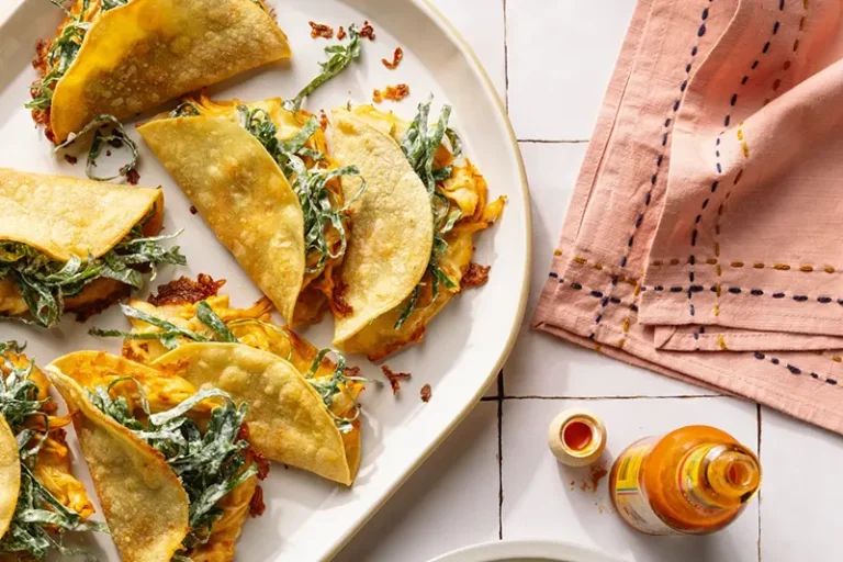 This image released by Voracious shows a recipe for chicken tacos from the cookbook “The Protein Meal Prep Plan” by Cassy Joy Garcia. (Alanna Hale/Voracious via AP)