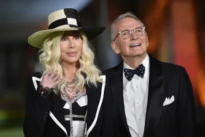 Cher, left, and designer Bob Mackie arrive at the Academy Museum of Motion Pictures Gala on Sept. 25, 2021, in Los Angeles. (Photo by Richard Shotwell/Invision/AP, File)