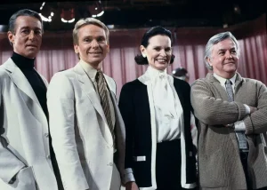 Fashion designers Halston, Bob Mackie, Gloria Vanderbilt and Geoffrey Beene pose on the set of "The Love Boat" in Los Angeles, Calif., on Feb. 3, 1981. (AP Photo/Wally Fong, File)