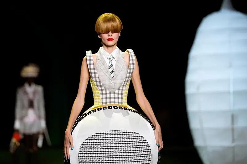 A model walks the runway during the Thom Browne Spring/Summer 2027 presentation as part of New York Fashion Week on Tuesday, Sept. 15, 2026, in New York. (Photo by Charles Sykes/Invision/AP)