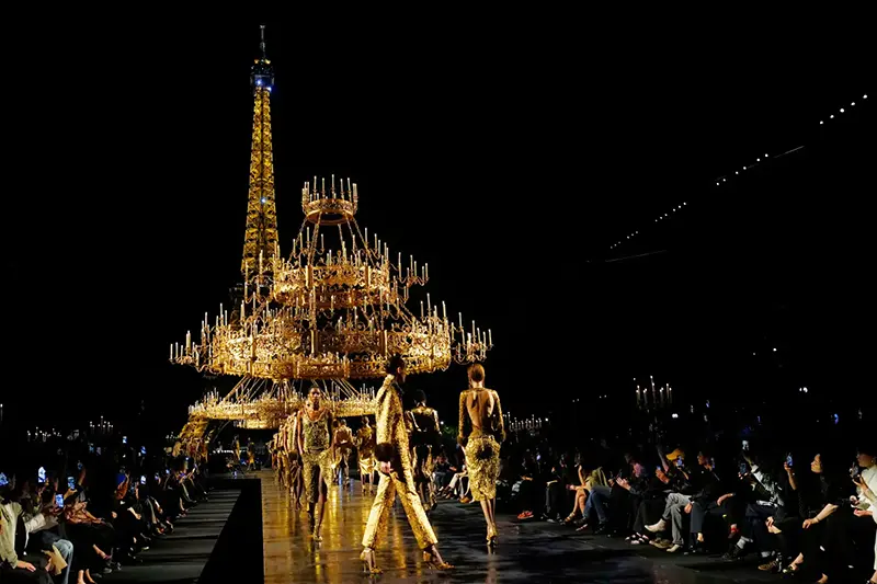Models wear creations as part of the Saint Laurent Womenswear Spring Summer 2027 collection presented in Paris, France, Tuesday, Sept. 29, 2026. (AP Photo/Teresa Suarez)